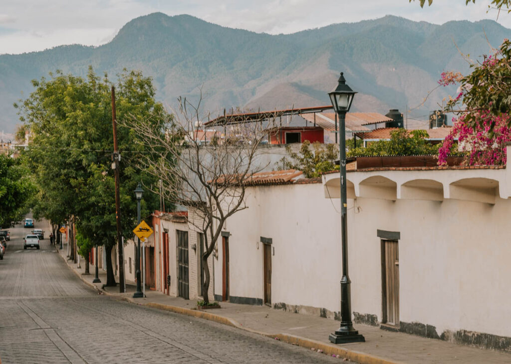 Streets of Oaxaca City with mountains in the background (Oaxaca City itinerary)