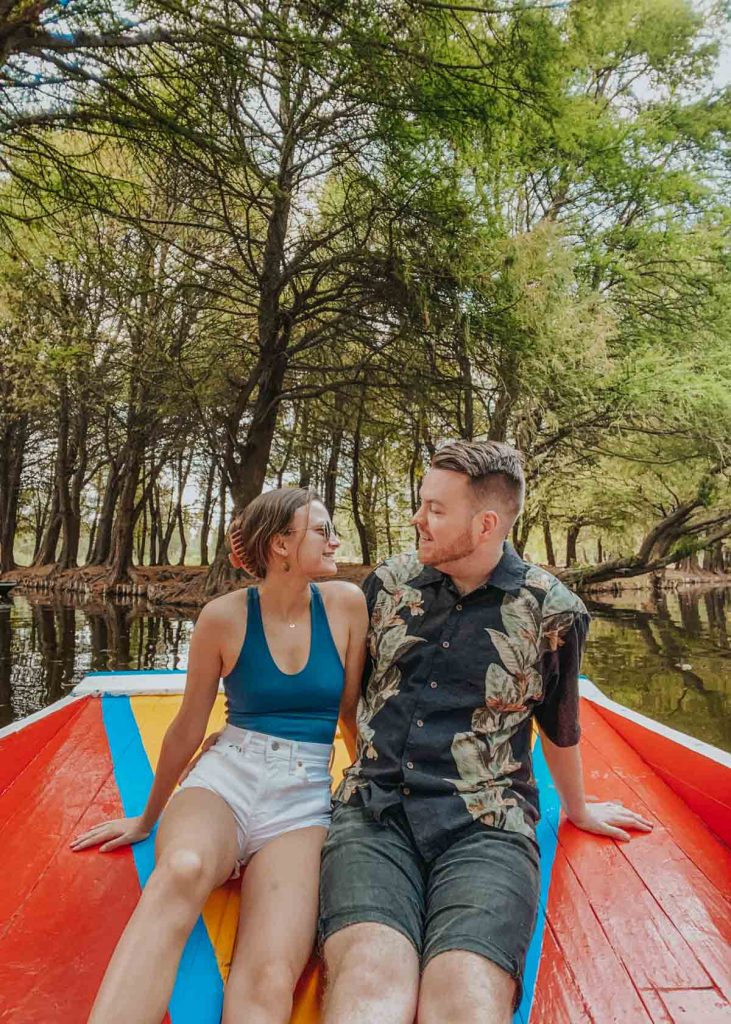 Couple on a boat in the floating gardens of Mexico City
