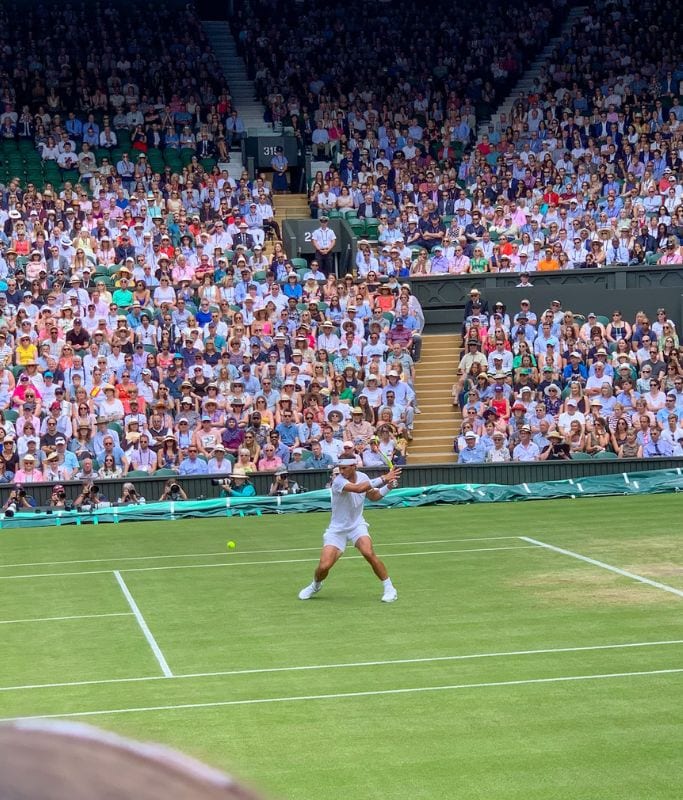 A picture of Rafa returning a ball on centre court