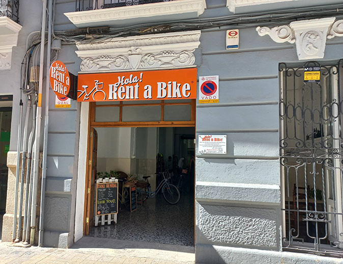the storefront of a bike rental place in Valencia